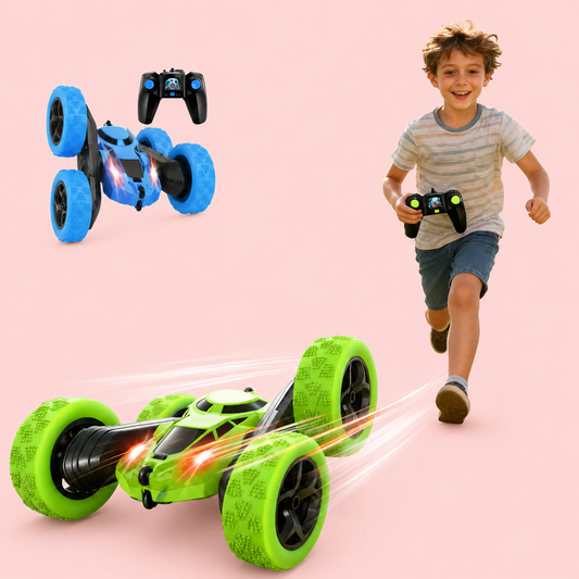 Child playing with a green and blue toy car on a pink background