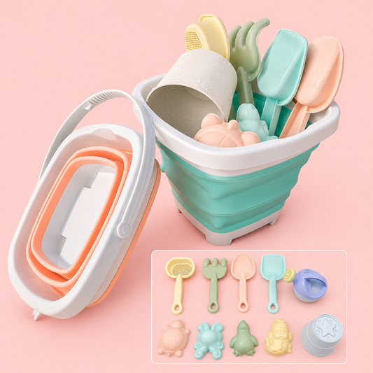 Collapsible bucket with colorful sand toys on a pink background