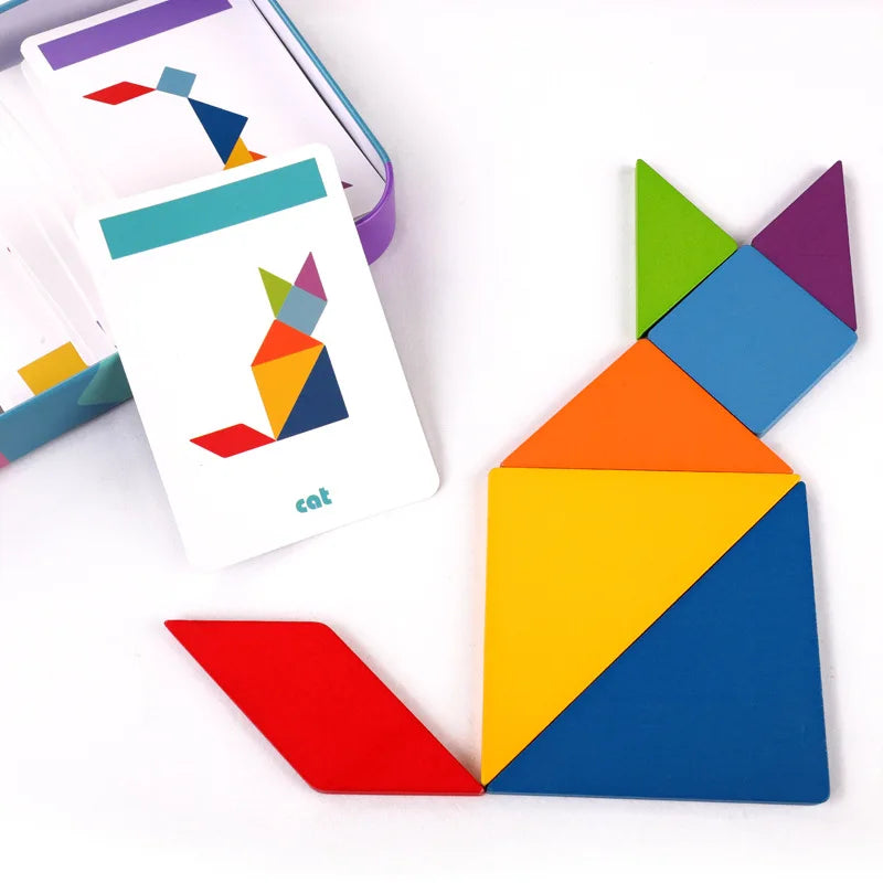 Colorful tangram puzzle shaped like a cat with cards in the background