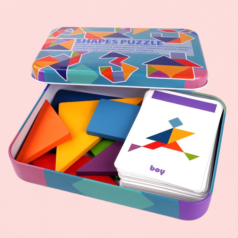 Colorful shapes puzzle set with cards in a tin on a pink background