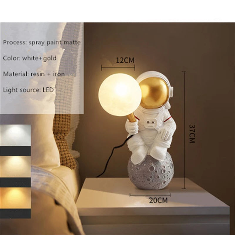 Decorative lamp shaped like an astronaut holding a light bulb on a table.