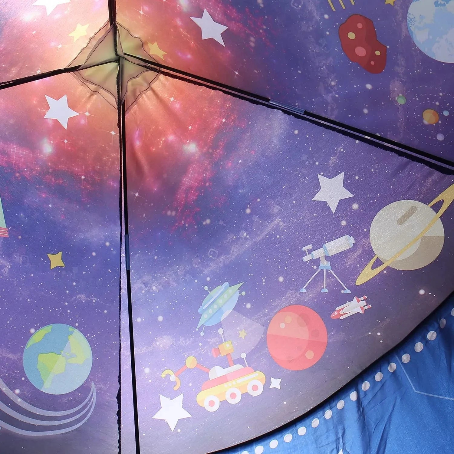 Children's tent with space-themed design featuring planets, stars, and rockets.