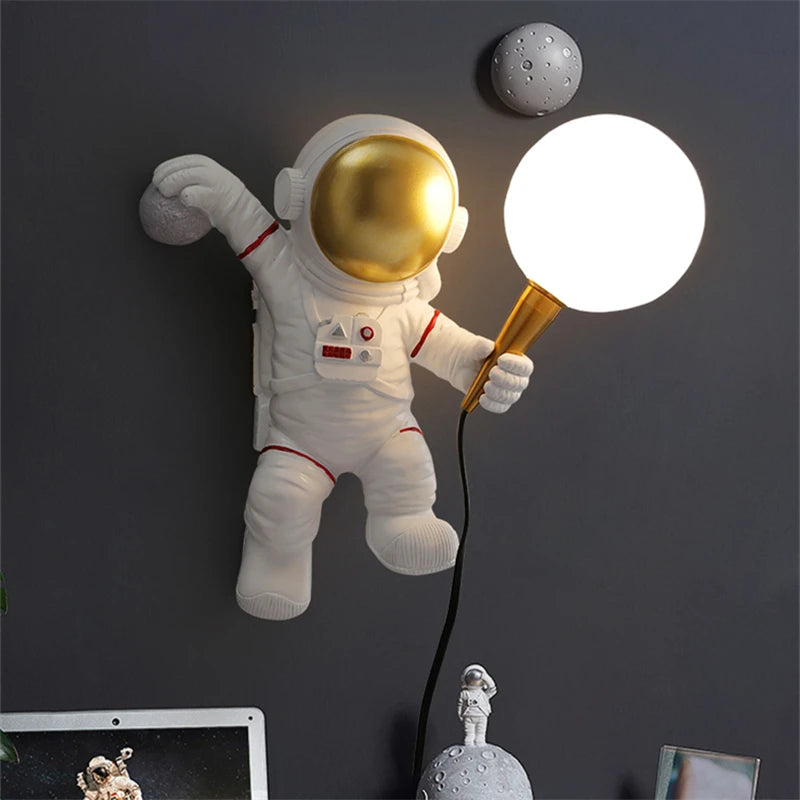 Astronaut lamp holding a light bulb against a dark background