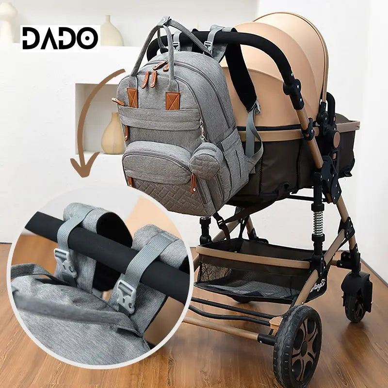 Gray backpack with stroller attachment and DADO branding