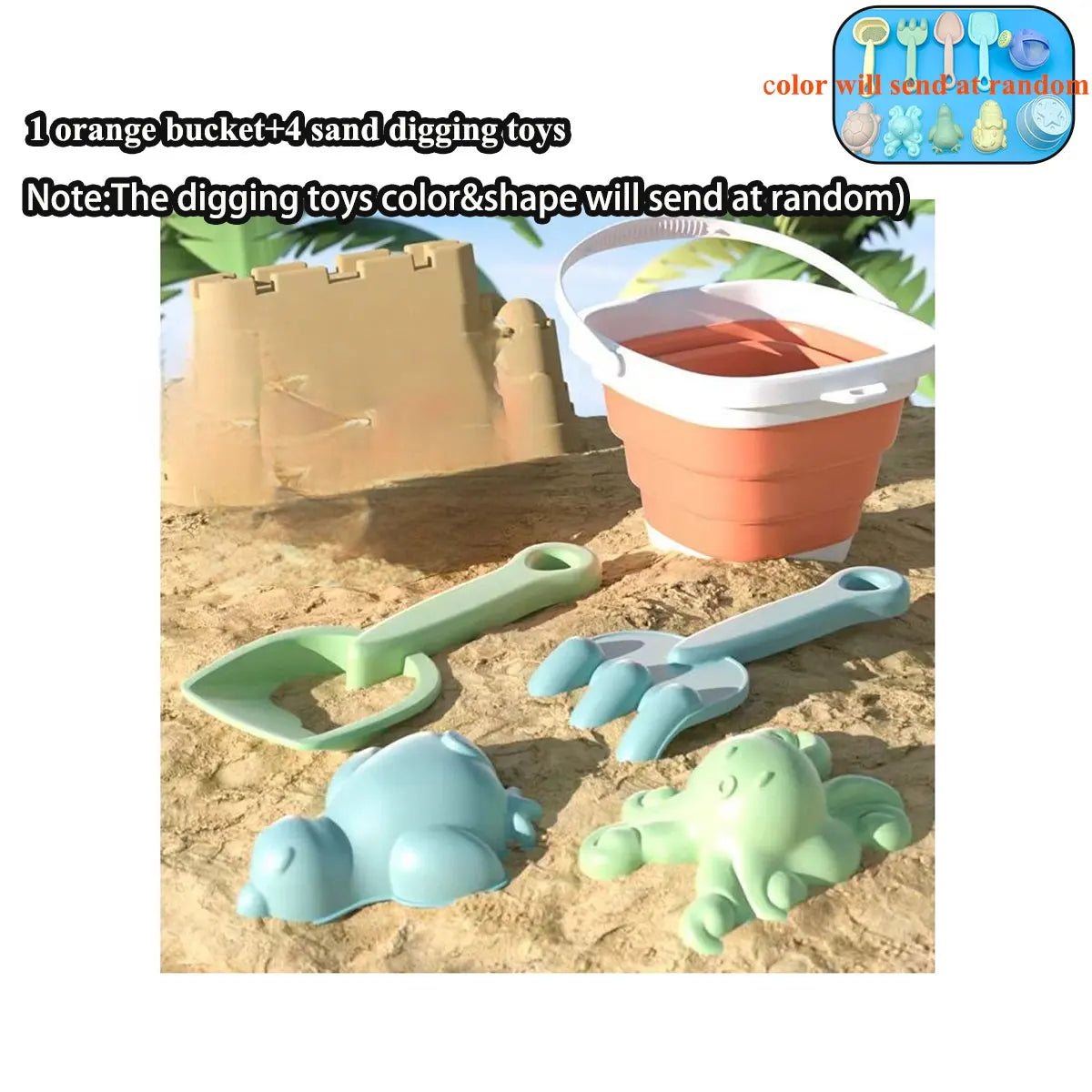 Orange bucket with sand digging toys on a sandy background
