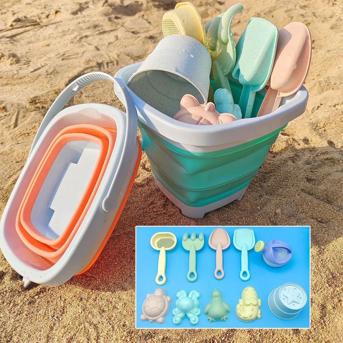 Collapsible sand pail with beach toys on sand, including a inset of toy set.
