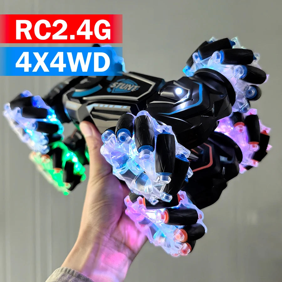Toy vehicle with LED lights held by a hand, labeled RC2.4G 4X4WD.