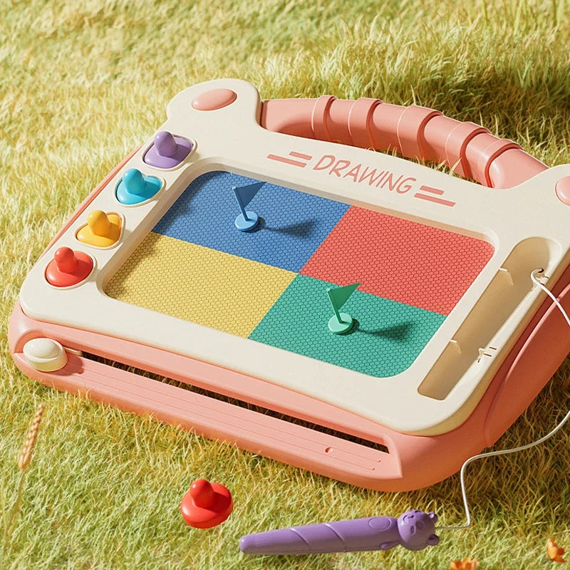 Child using a colorful drawing board with markers