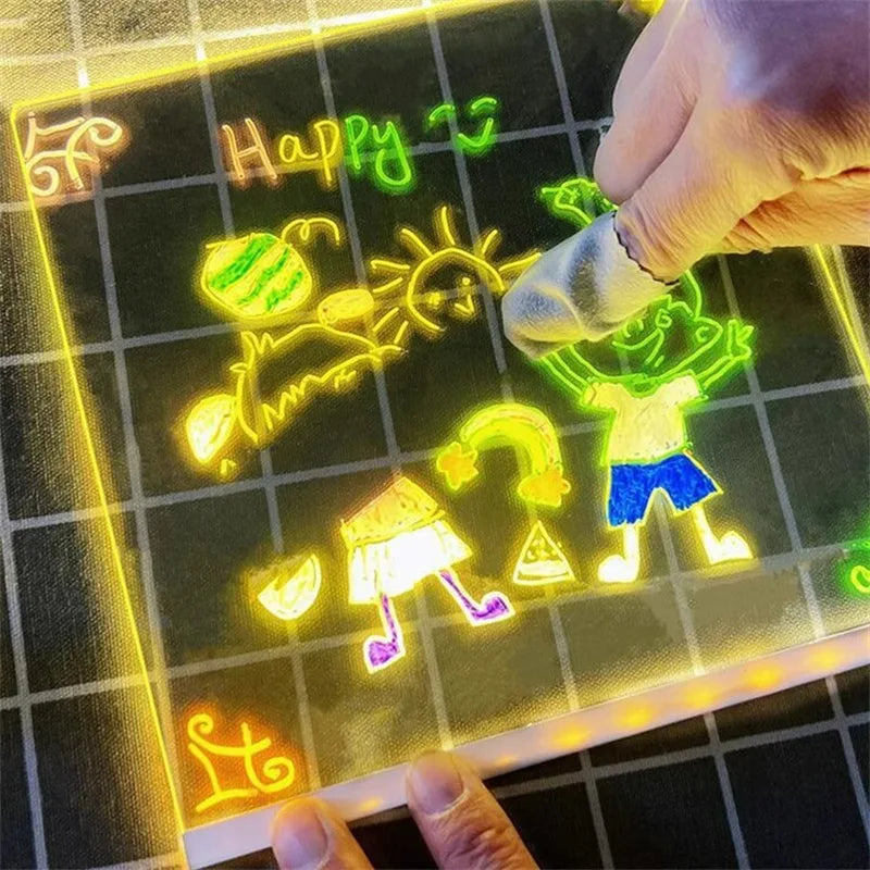 Glowing neon drawings on a grid surface with a hand holding a marker.