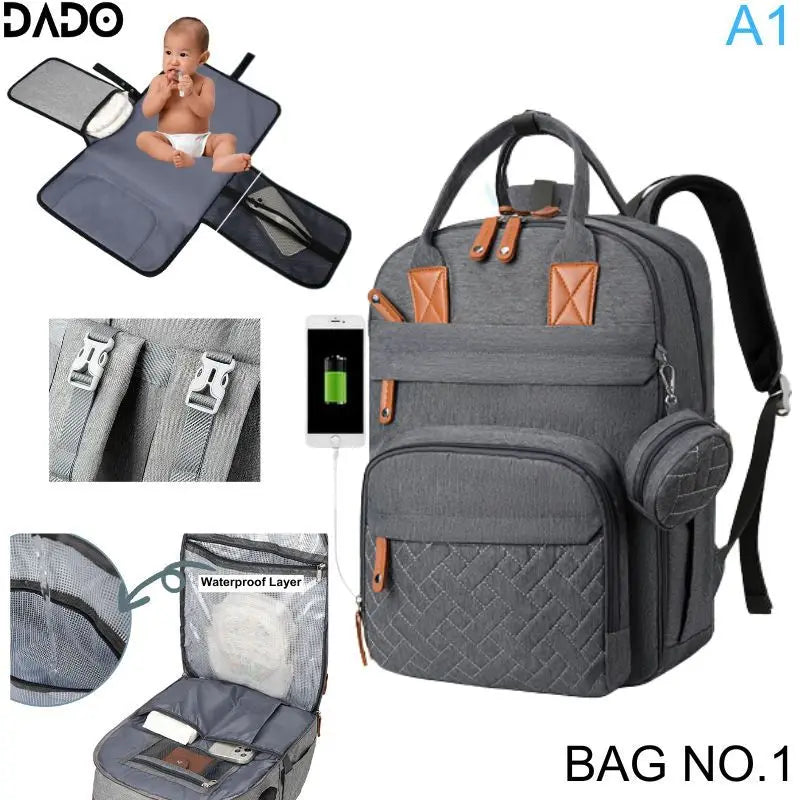 Gray backpack with multiple compartments and features, including a baby changing pad and waterproof layer, on a white background.