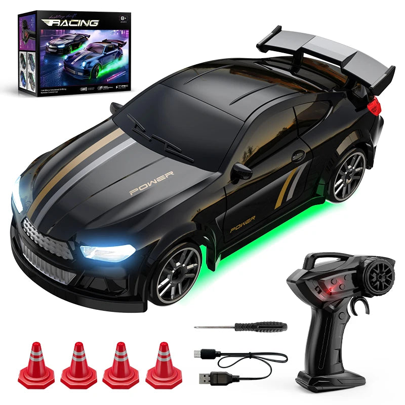 Black toy racing Drift car with remote control, cones, and USB cable.