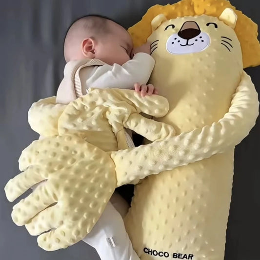 Baby hugging a lion-shaped plush toy with 'Choco Bear' branding.