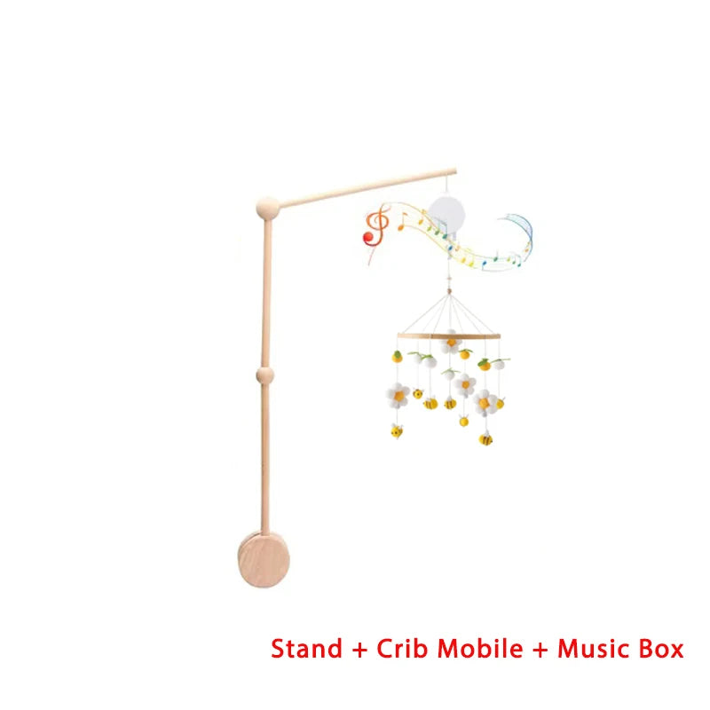 Wooden Baby crib music box mobile with stand on a white background