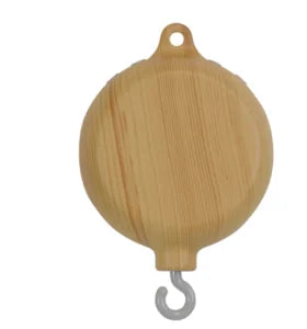 Wooden float with a crib mobile hook on a white background