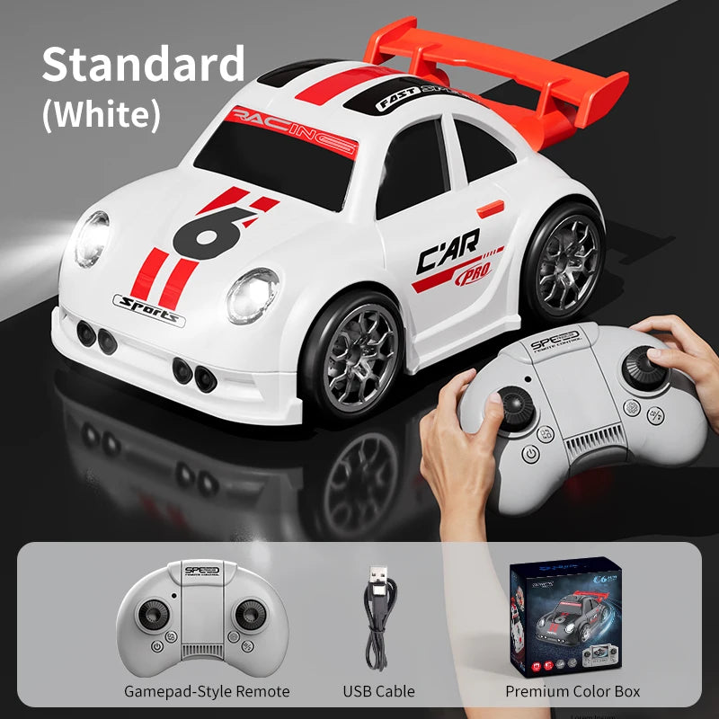 White toy car with red and black details, remote control, and accessories.