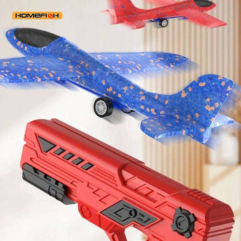 Red and blue toy planes with a launching device