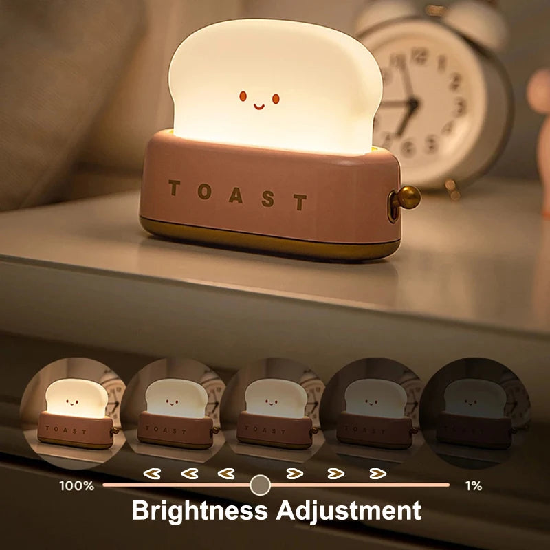 Cute toaster-shaped night light with a smiley face on a shelf, showing brightness adjustment options.