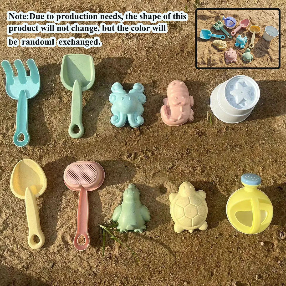 Set of colorful sand toys including shovels, rakes, and molds on a sandy surface.