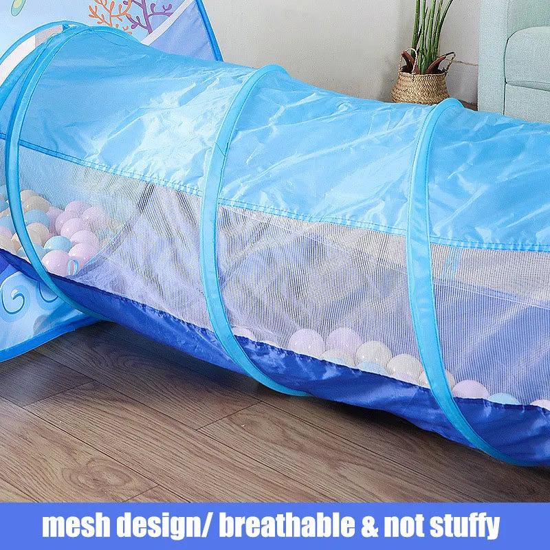 Blue mesh play tunnel with text 'mesh design/ breathable & not stuffy' on a wooden floor.