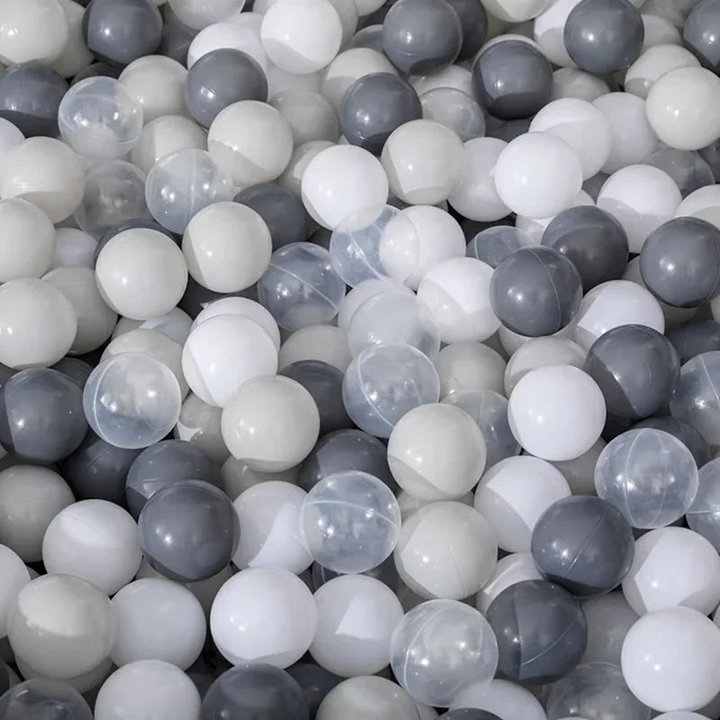 Close-up of a pile of gray and white balls for tent ball pitt