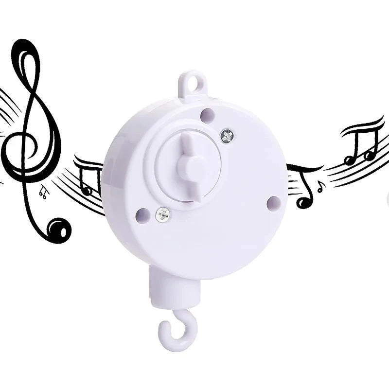 White mechanical device with a crib mobile musical hook on a white background with musical notes.