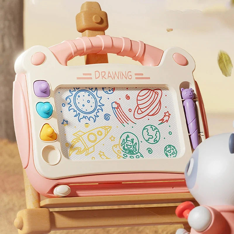 Child using a colorful drawing board with markers