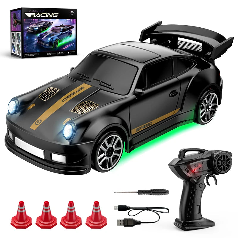 Black and gold toy racing Drift car with remote control, cones, and USB cable.