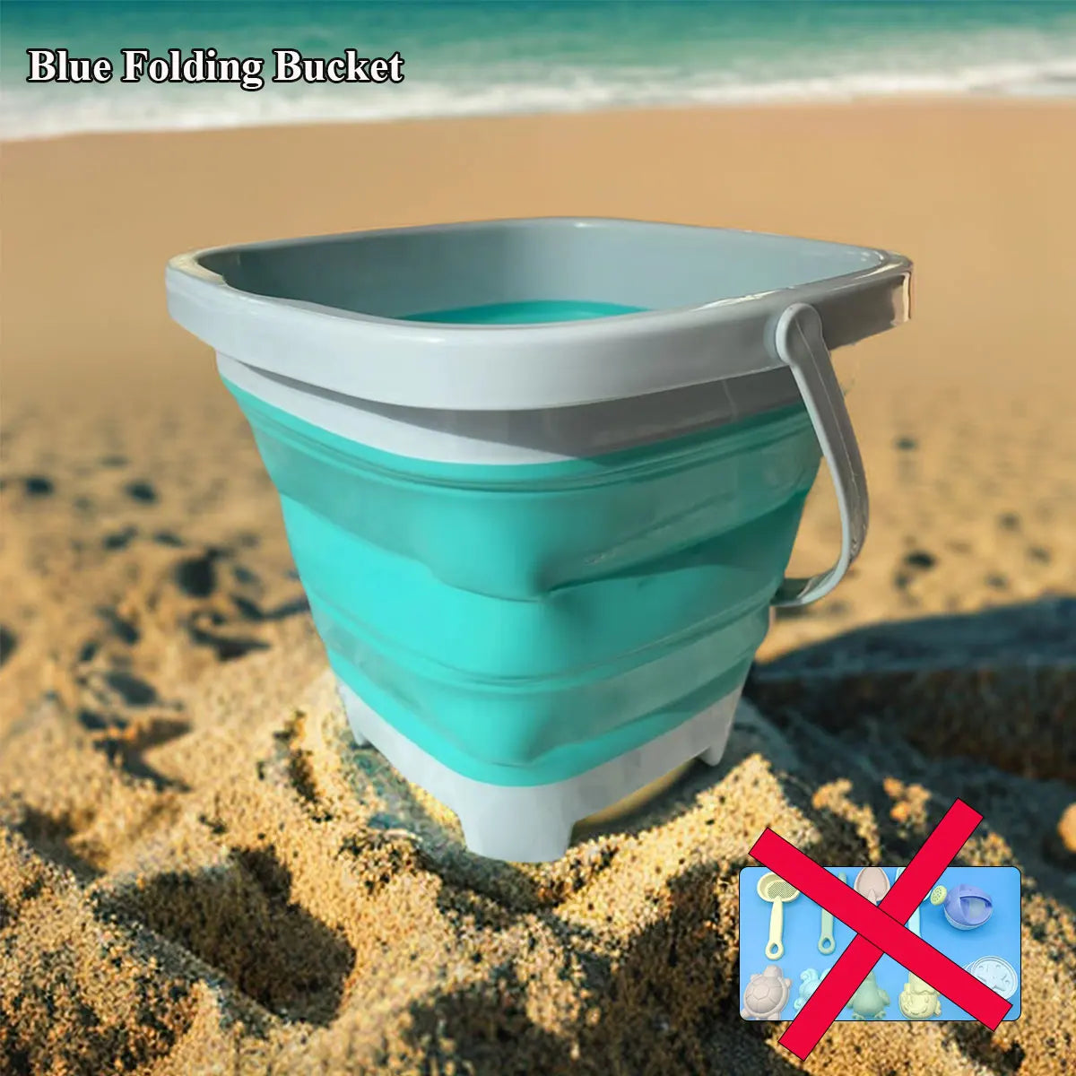 Blue folding bucket on a sandy beach with ocean in the background