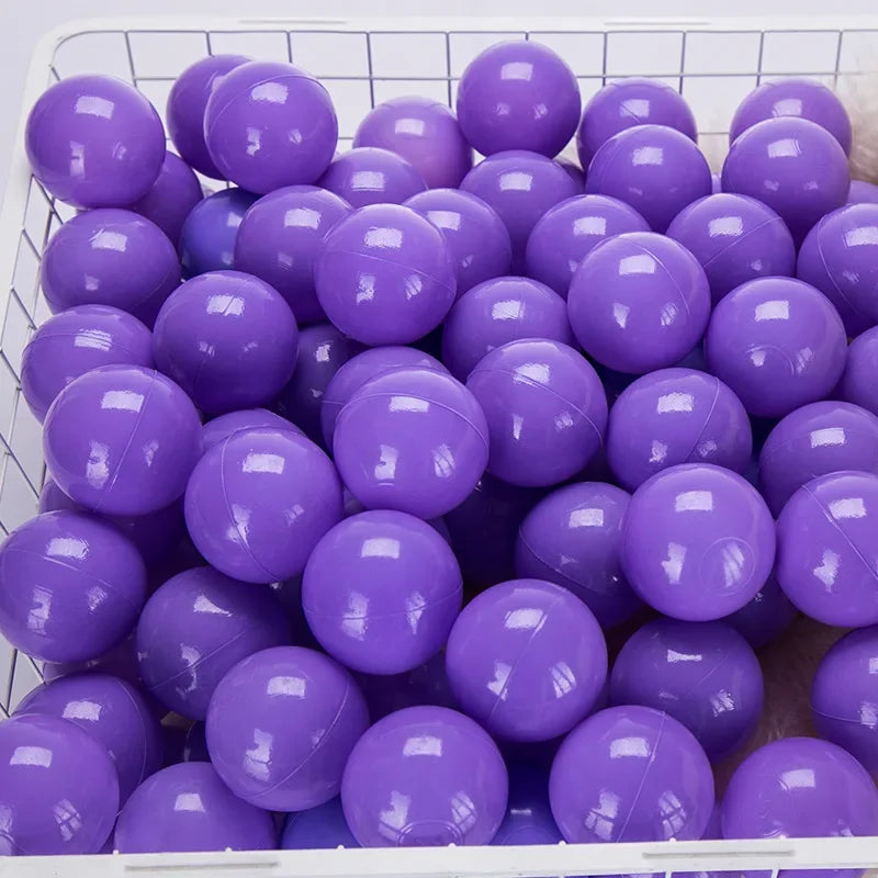 Basket filled with purple balls for tent ball pitt