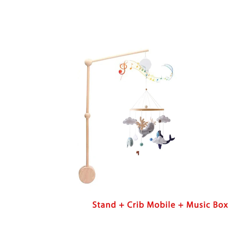 Baby crib mobile with stand and music box on a white background