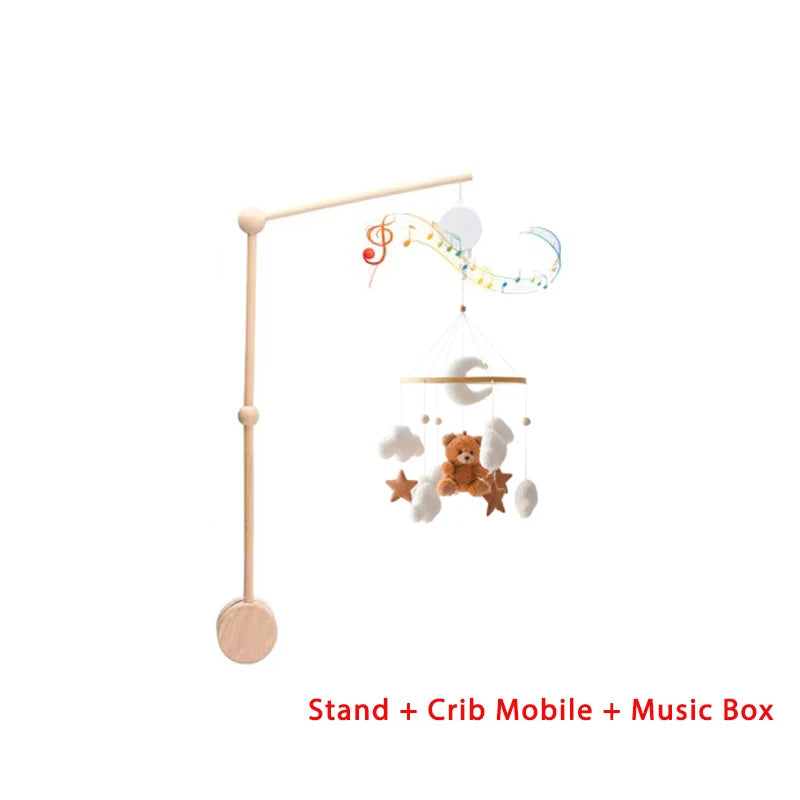 Baby crib mobile with stand and music box on a white background