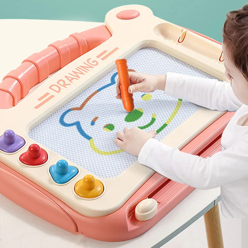Child using a colorful drawing board with markers