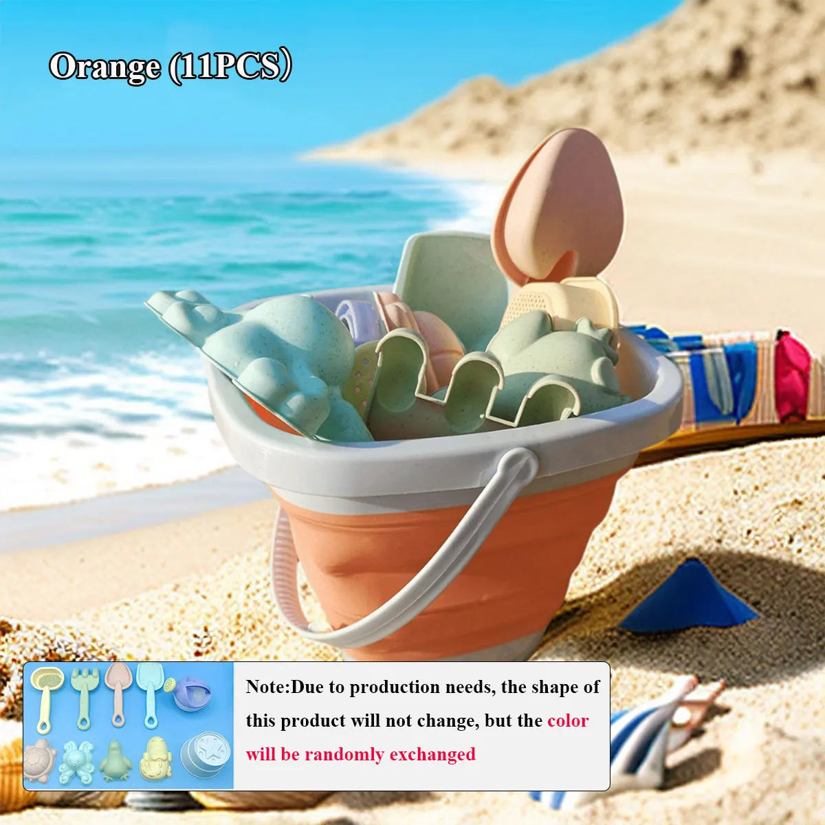 Children's sand toys set with bucket on a sandy beach