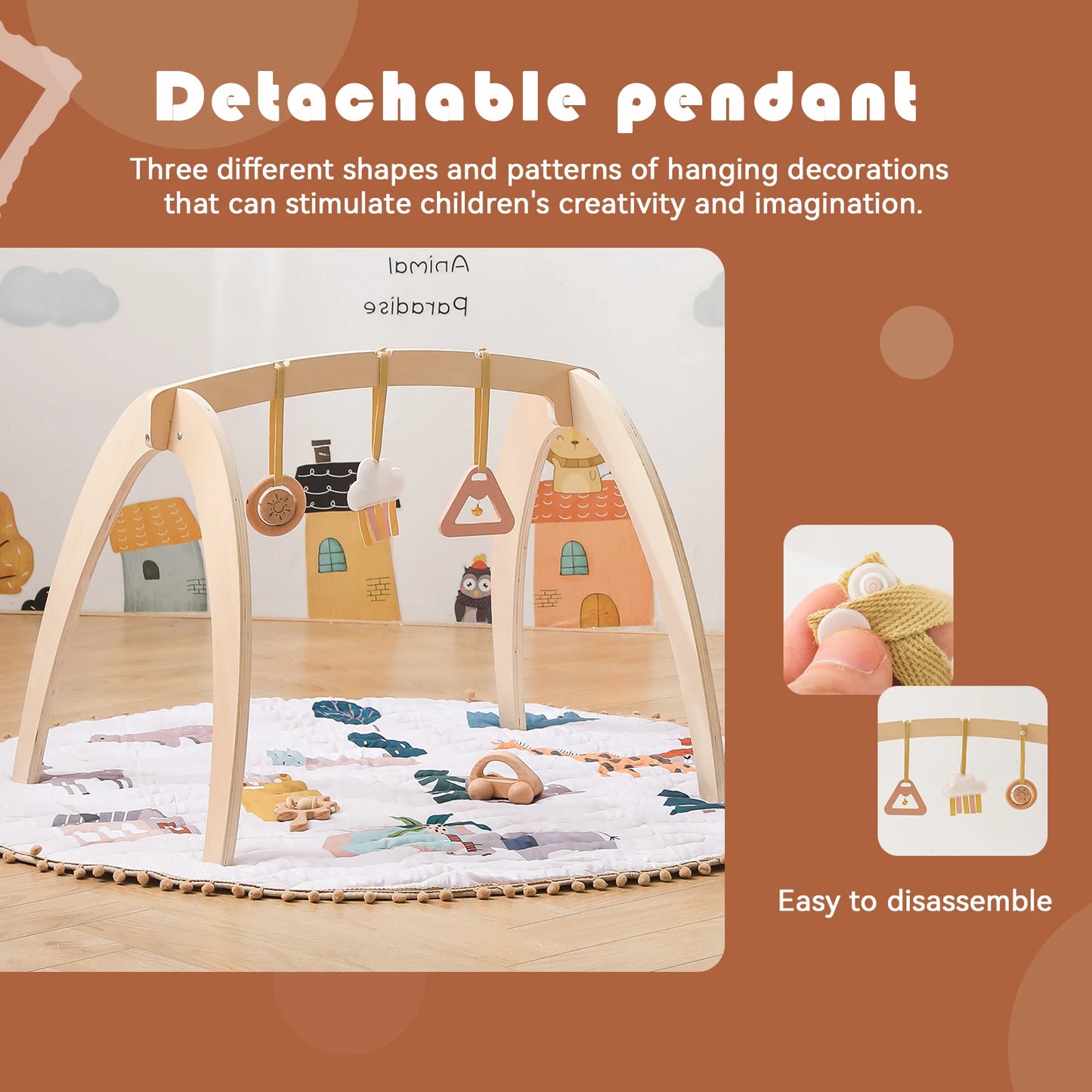 Wooden play gym with detachable pendant and colorful mat on a brown background