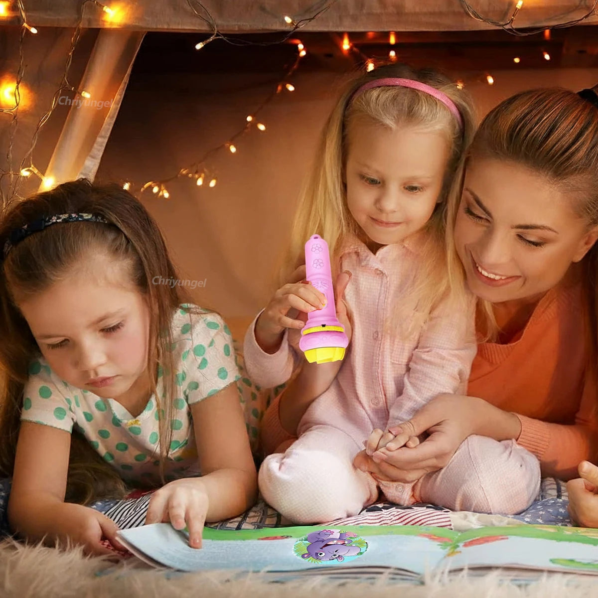 Child playing with a toy torch projector that has projection of animals, vehicles etc